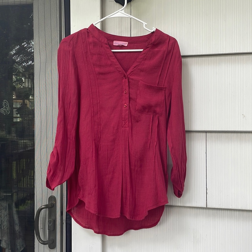 Long sleeve red button up shirt